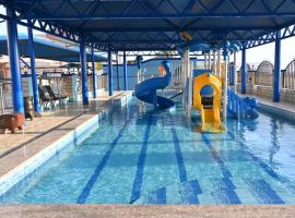 منتجع شاطئ العرب الرايس, Hotel in Rayyis