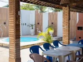 Casa Duplex com 2 suítes com ar condicionado ,100m da Praia - Barra de São Miguel, a 8 minutos da praia do gunga e a 3 da praia bonita! Condomínio com piscina e churrasqueira!