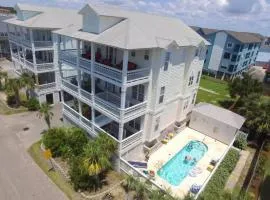 Stay Salty Villa with views of canal and short walk to beach