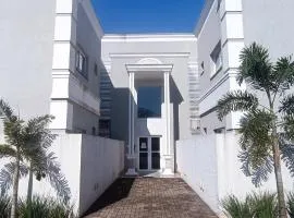 Apto novo, central e aconchegante em Foz