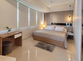 Apartment Nuvasa Bay Nongsa, Kalani 1BR 8th, Sea & Golf View, Batam, хотел на плажа в Nongsa