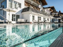 Berghotel Almrausch, hotel v mestu Berwang