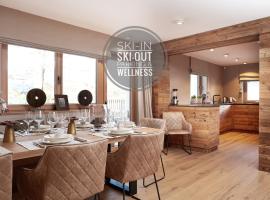 HAHNENKAMM SUITE Ski-in Ski-out direkt an der Hahnenkammbahn, παραλιακό ξενοδοχείο στο Κίτσμπουελ
