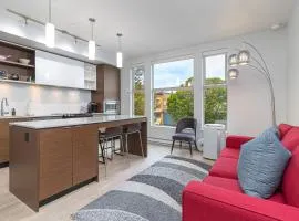 Sleek Kitchen Island And Garden Views