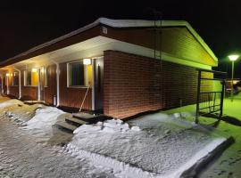 M&auml;ntyp&auml;&auml;, keskell&auml; Vuokattia, resort de esqui em Vuokatti