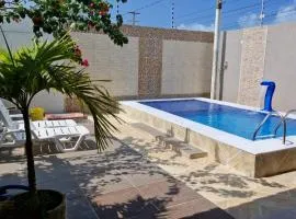 CASA de PRAIA NO FRANCÊS 3 QUARTOS SENDO 1 SUITE