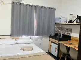 Flat com ar e varanda com linda vista para o Ibituruna - Vôo Livre 203