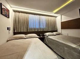 Lindo Flat com 2 camas casal a 50m da praia