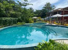 Casa de Praia em Imbassaí com Varanda, Conforto e Natureza