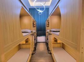 太空舱青年寓舍深圳北站Youth dormitory Shenzhen North Branch, hotell sihtkohas Lung Wa