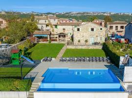 Villa Denis Village in Central Istria for 28 people pet friendly complex of 4 stone houses, Hotel in Buzet