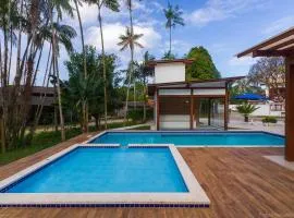 Casa Caiçarinha perto do centro com ar e piscina