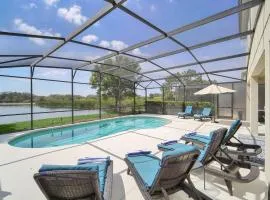 Stunning Lake View from South Facing Extended Pool Deck with Games Room on Gated Solterra Resort