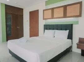 Spacious and Homey 2BR Mangga Dua Apartment By Travelio