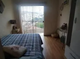 Quarto aconchegante Bela Vista