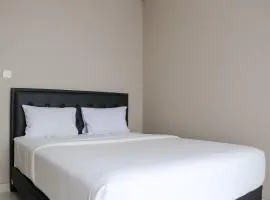 Spacious and Homey 2BR at Ciputra International Apartment By Travelio