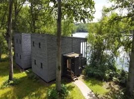 Lake house in forest by belvilla