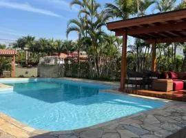 Linda casa com piscina privativa Morada da Praia 3 quartos e 4 banheiros Aceita Pet Wi-fi na casa toda Área gourmet com churrasqueira acomoda até 15 pessoas com muito conforto 2 bicicletas disponíveis para um passeio pelo condomíno
