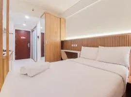 Comfy and Homey Studio at Sky House BSD Apartment By Travelio