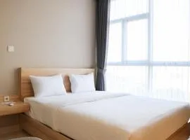 Wonderful and Homey 1BR Ciputra International Apartment By Travelio