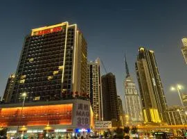 5min to Dubai mall Burj Khalifa with Canal View
