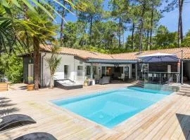 Villa d'architecte avec piscine chauffée et borne de recharge, parfaite pour des vacances en famille - FR-1-791-4