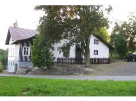 Holiday home in a quiet, authentic mountain village with a view of the surrounding hills