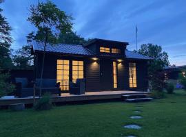 Tiny house hidden in the backyard, tiny house in Höllviken
