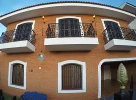 Extensão Black - Ipê Rosa Hotel