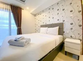 Restful and Elegant 1BR Patraland Amarta Apartment By Travelio