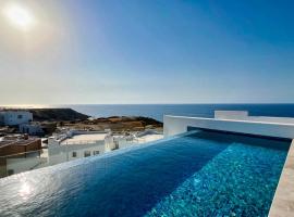 Mykonos Homes - Luxuriöses Penthouse mit Rooftop Pool, Meerblick, Gym, hotel v destinaci Kalogrea