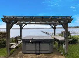3BR Fife Lake Getaway with Fire Pit & Hot Tub