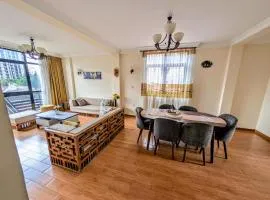 Bright, Modern 2 Bedroom Apt - Secure & Close to Airport