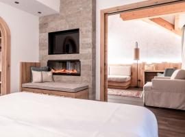Renè Dolomites Boutique Hotel, hotel v destinaci Pozza di Fassa