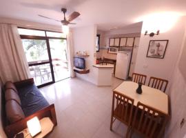 Riviera de São Lourenço Apto Completo com Churrasqueira Serviço de Praia Piscina aquecida Sauna salão de jogos e quadra, hotel in Riviera de São Lourenço