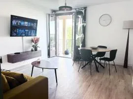 Appartement 79m2 proche Airbus tout confort lumineux 2 chambres, 1 bureau