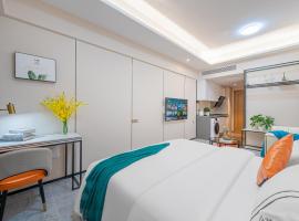 Kerry Seasons Aparthotel, hotell i Wanzai