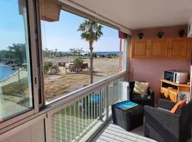 Amoureva B35, T2 vue mer, parking, piscine, clim