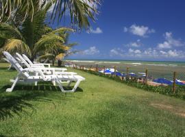 Paraíso dos Corais, отель в городе Гуарахуба, рядом находится Surf Beach