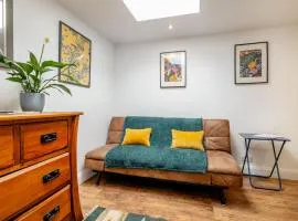 Self contained two room studio apartment, own entrance, private parking