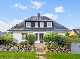 Ferienwohnung Strandflieder Archsum Sylt，阿克斯姆的飯店