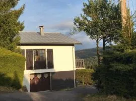 Grand chalet de charme cosy, sauna & vue de rêve