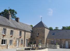Domaine de la Tour carr&eacute;e - 3 Chambres, bed and breakfast i Beno&icirc;tville