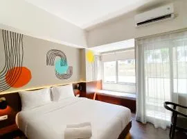 Homey Studio No Kitchen at Gateway Park LRT City Jatibening Apartment By Travelio