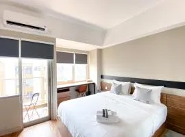 Homey and Simply Look Studio Gateway Park LRT City Jatibening Apartment By Travelio