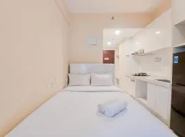 Well Furnished and Homey Studio Room Sky House BSD Apartment By Travelio