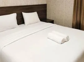 Comfort and Simply 1BR at Patraland Amarta Apartment By Travelio