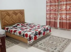 Charmant Appartement 2 chambres avec Internet et Vue Panoramique - au Cœur du Quartier Prestigieux d'Ennasr 2, Proche de Toutes Commodités - Service Navette