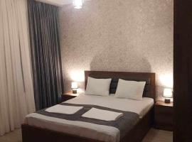 Guest house Glicinia, hotel i Tsqaltubo