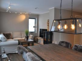 Leilighet sentralt på Sjusjøen, 11 sengeplasser, hotel en Ringsaker